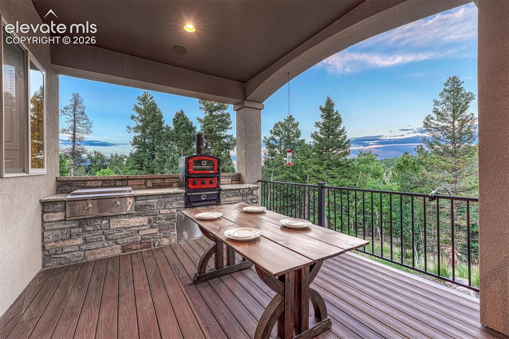 Covered outdoor patio with wood-finish decking