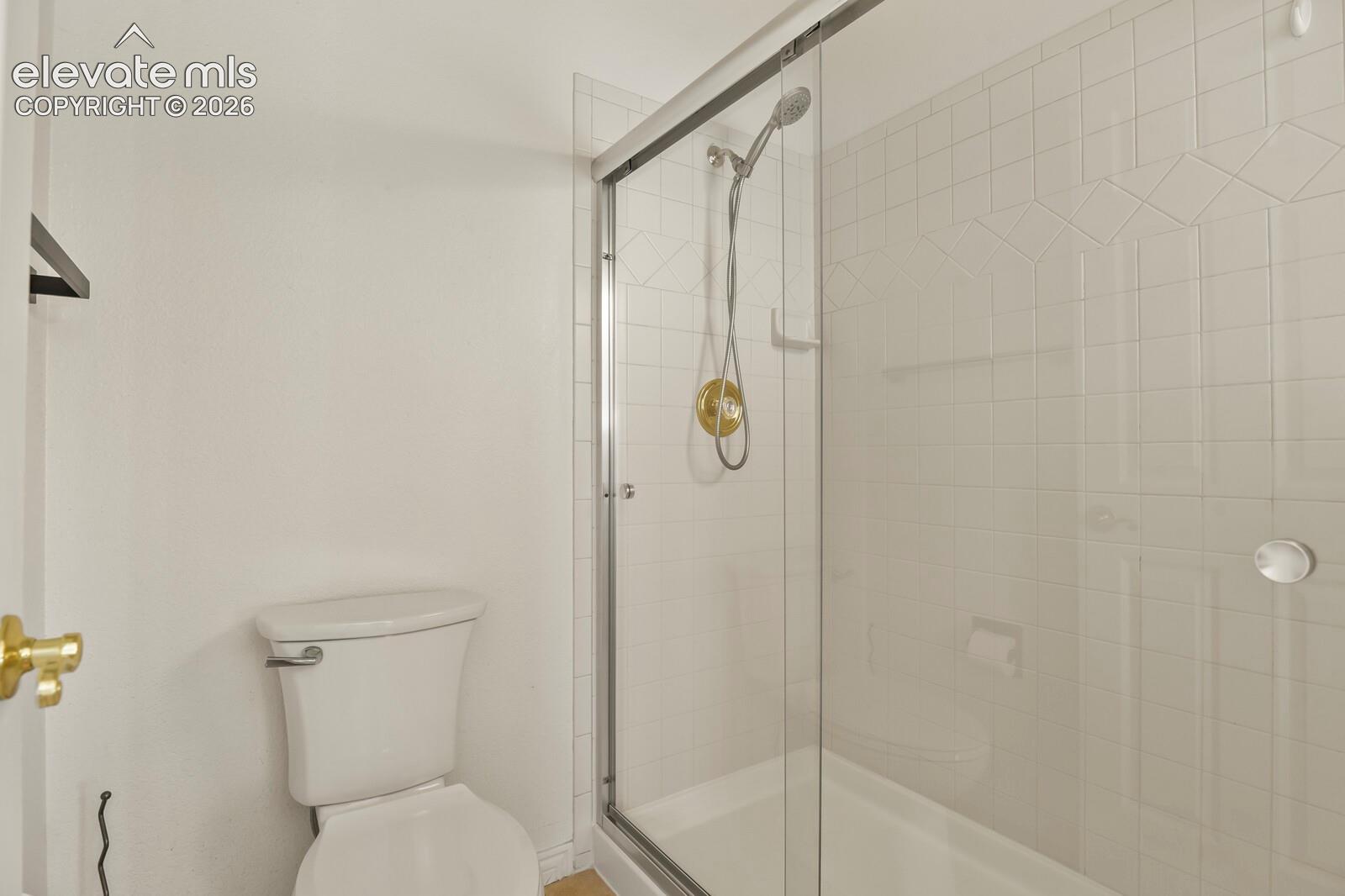 Primary Separate Shower and toilet area with a door!