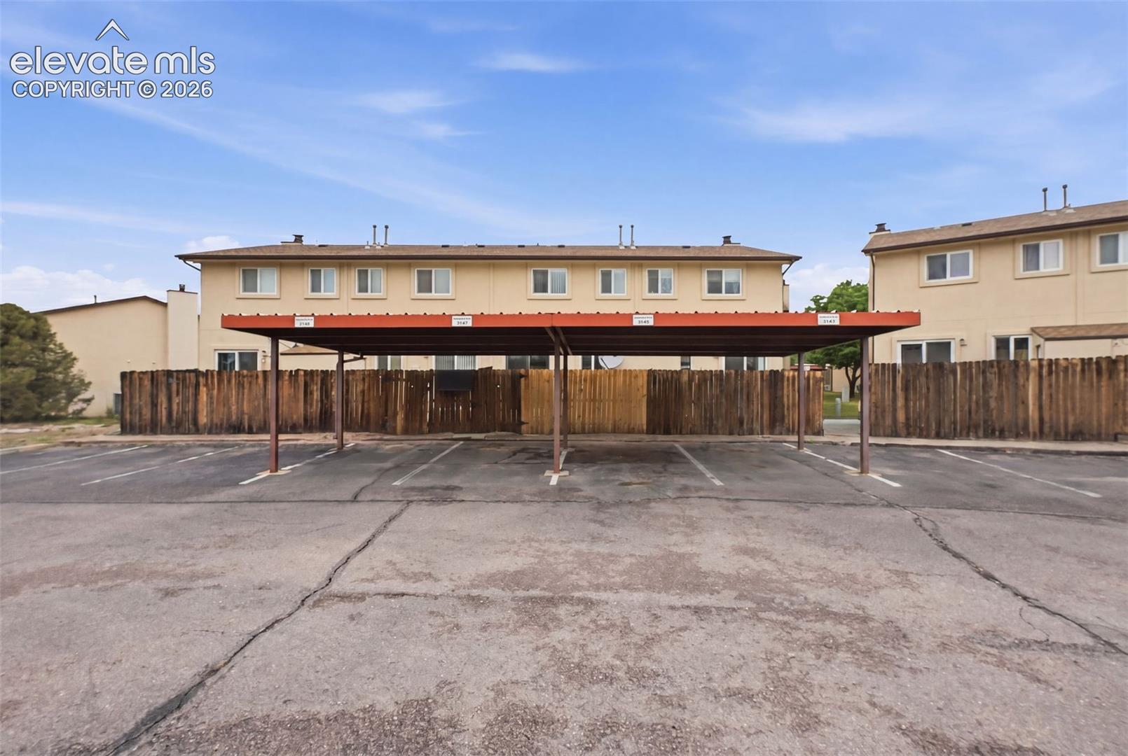  With assigned carport