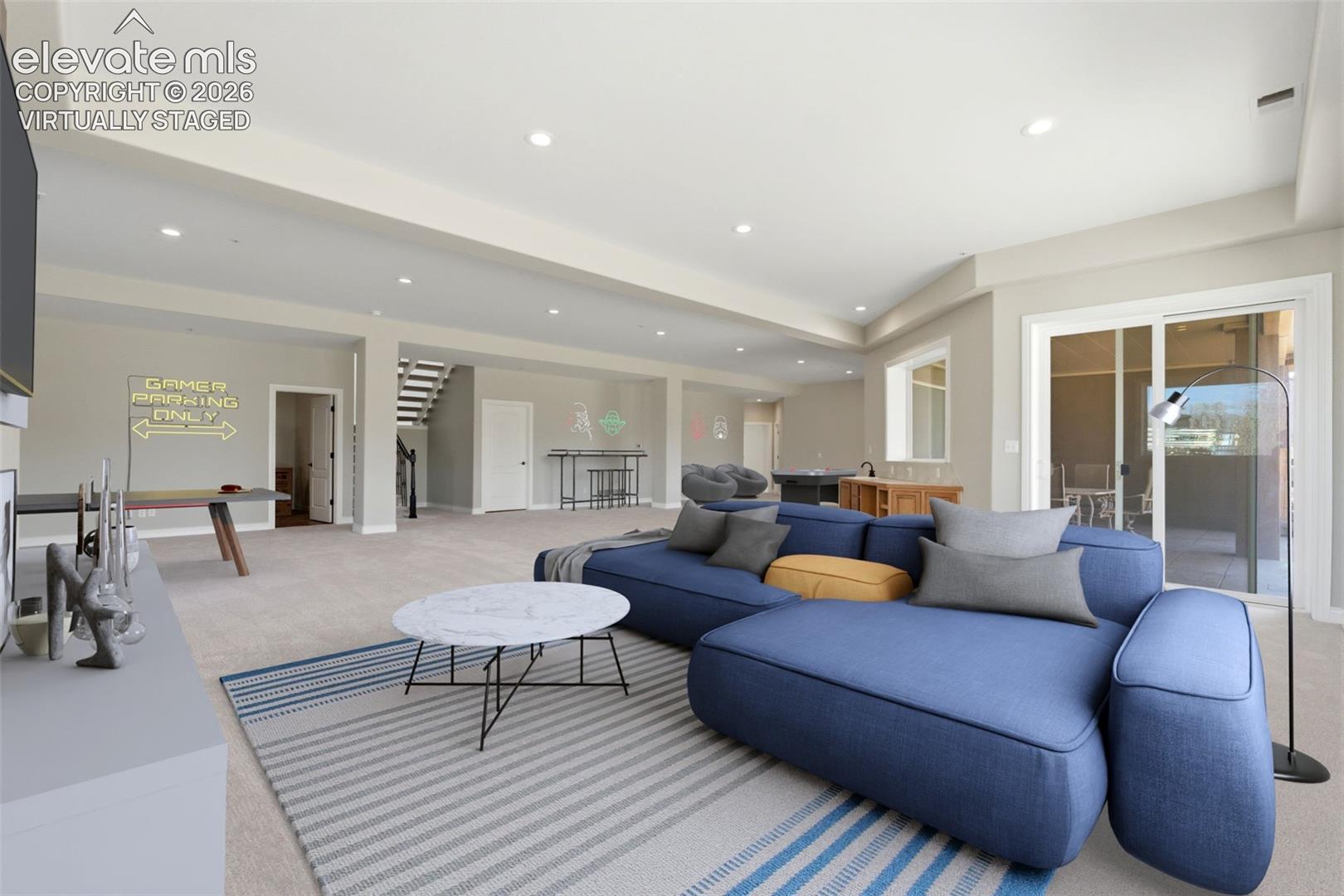 Virtually staged. Spacious room with recessed lighting, sliding glass doors, and light-colored carpeting