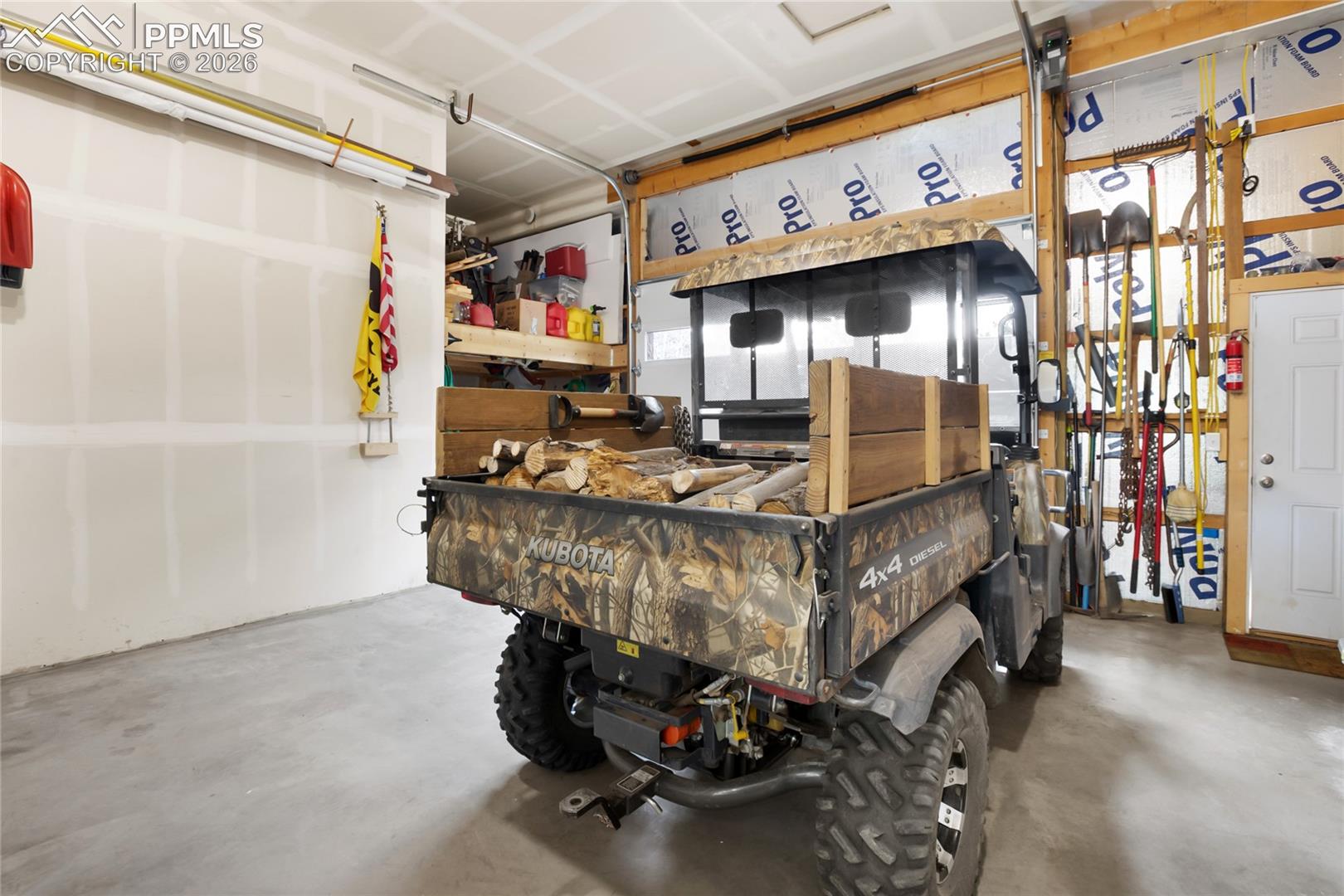 HUGE garage for your car, your ATV and all your storage too!