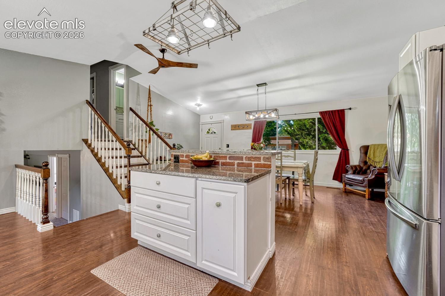 View of the Dining Room and Front Entry from the Kitchen.
