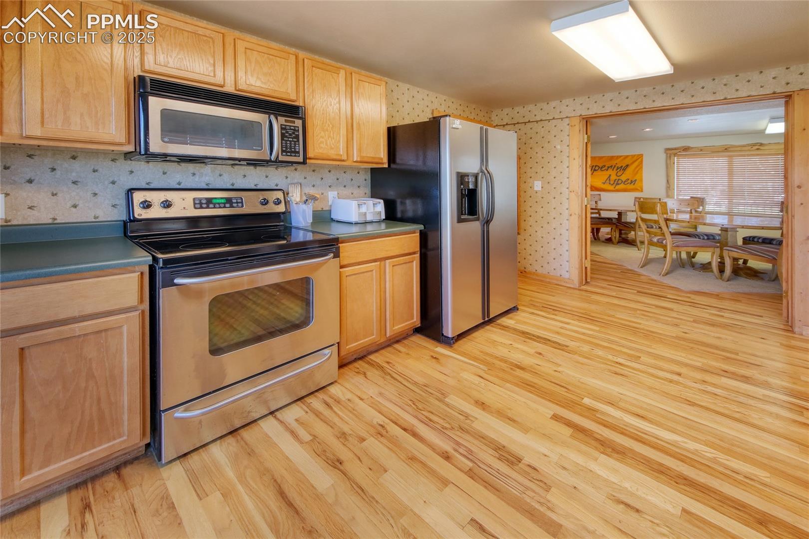 CH Kitchen featuring appliances with stainless steel finishes