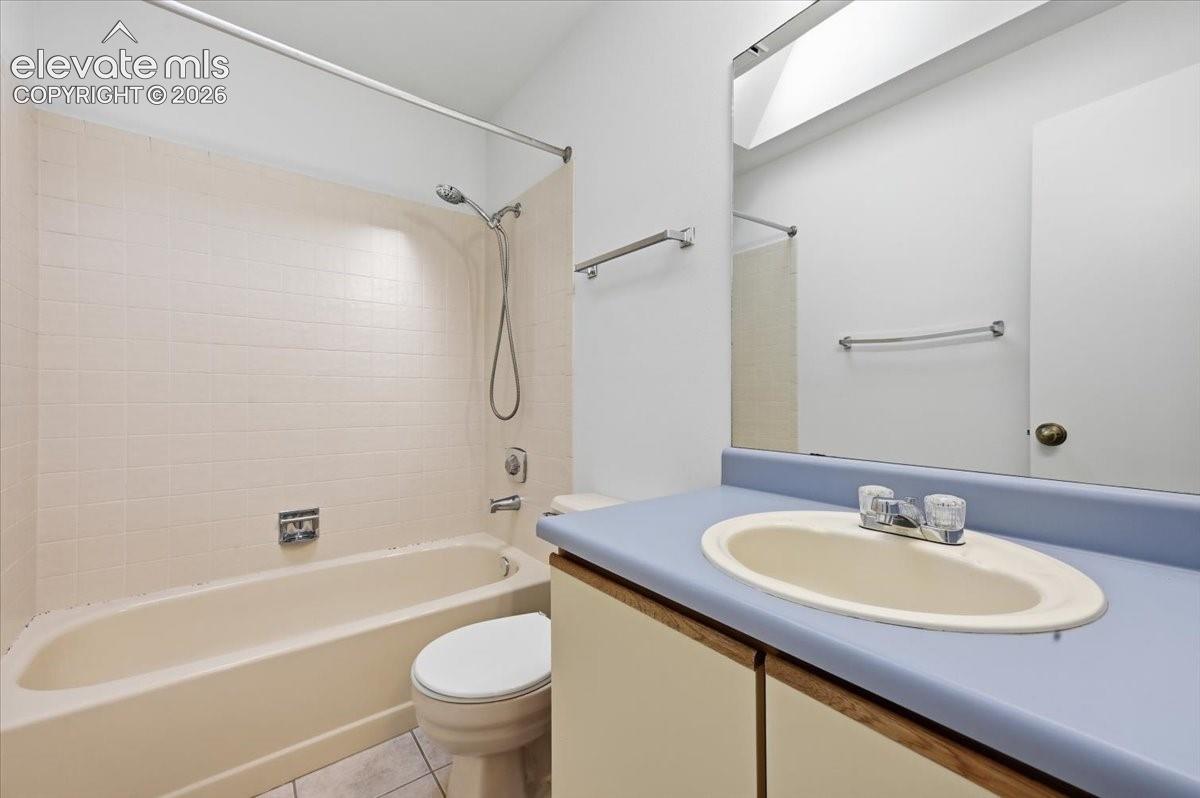 Full upper-level bathroom with a tub-shower combo at , Colorado Springs, CO.