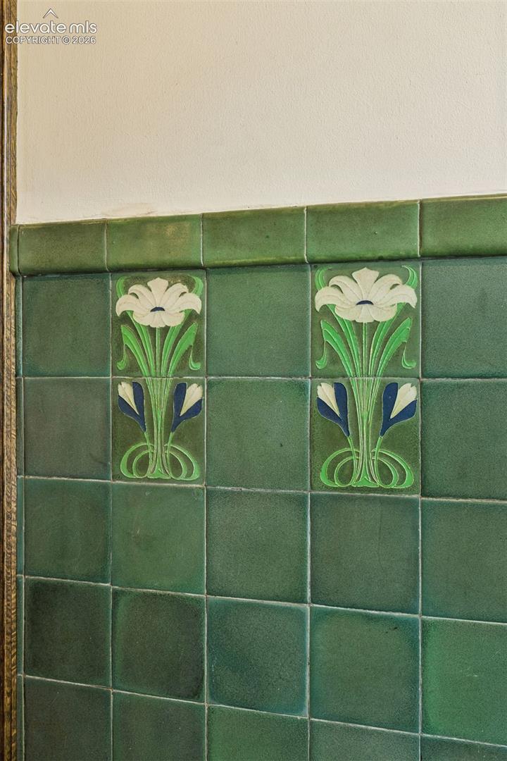Van Briggle tile adorn the portico entry room