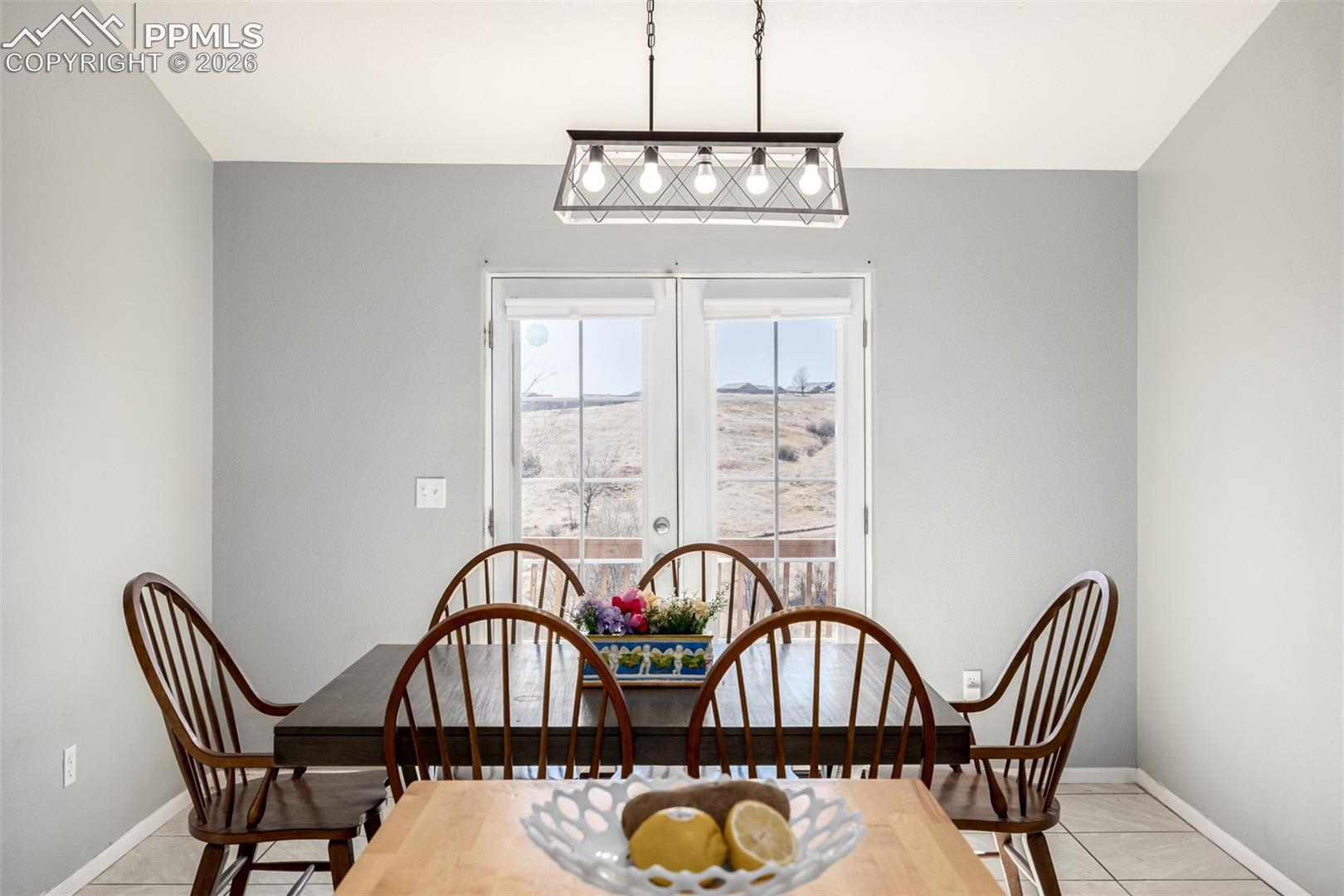 Dining Area Overlooking Mountain Views and Open Space