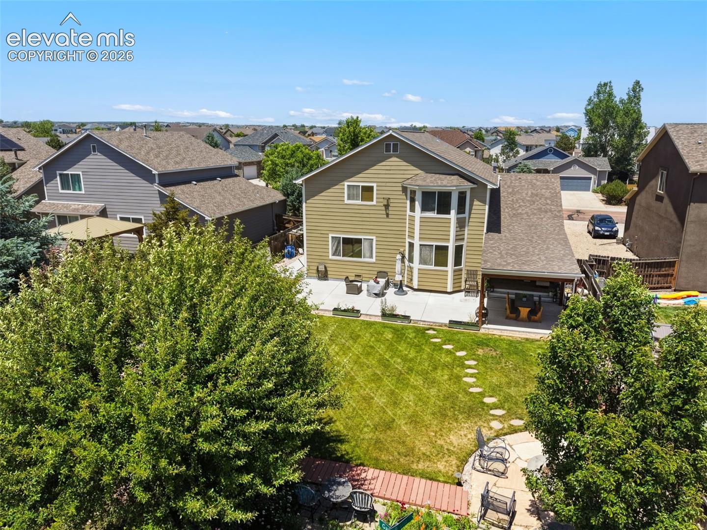 Fenced Backyard & Established Woodmen Hills Setting