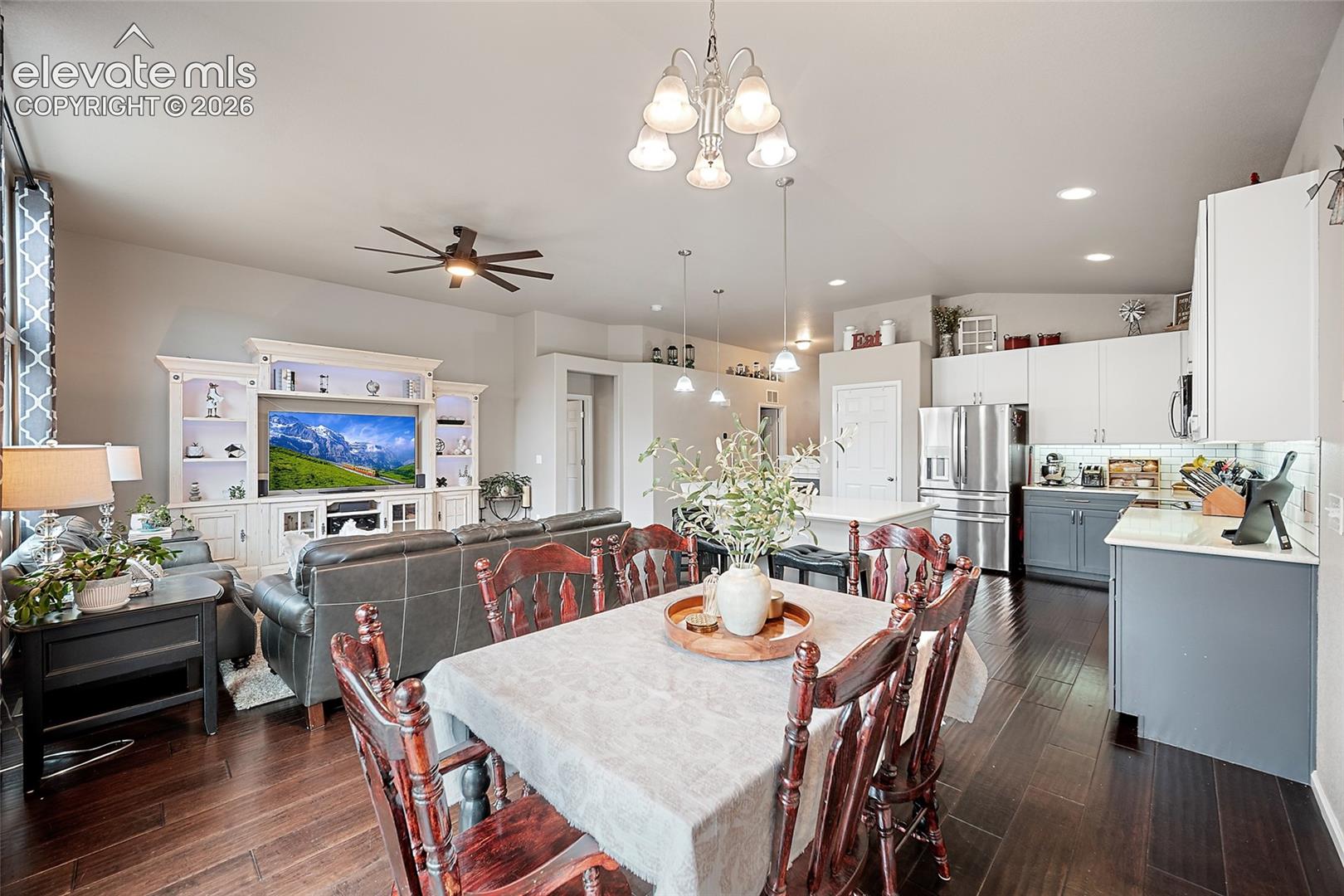 Dining area conveniently located beside the kitchen with access to the outdoor living space.