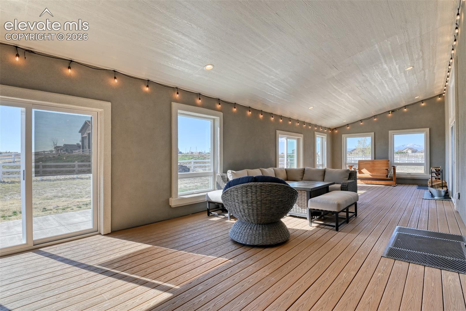 Enclosed Covered patio off of family room.