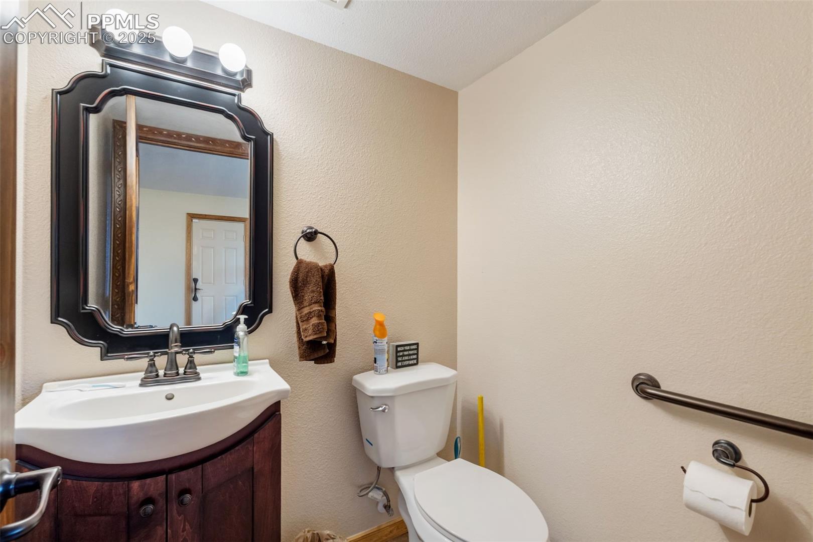 Updated half bathroom in lower-level.