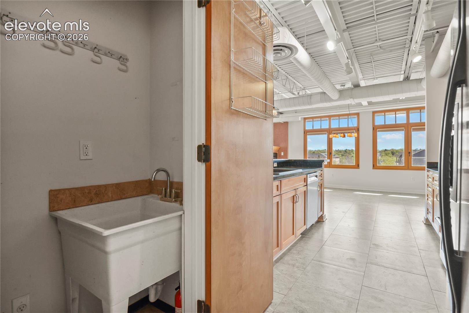 Utility sink and extra storage in second pantry space. 