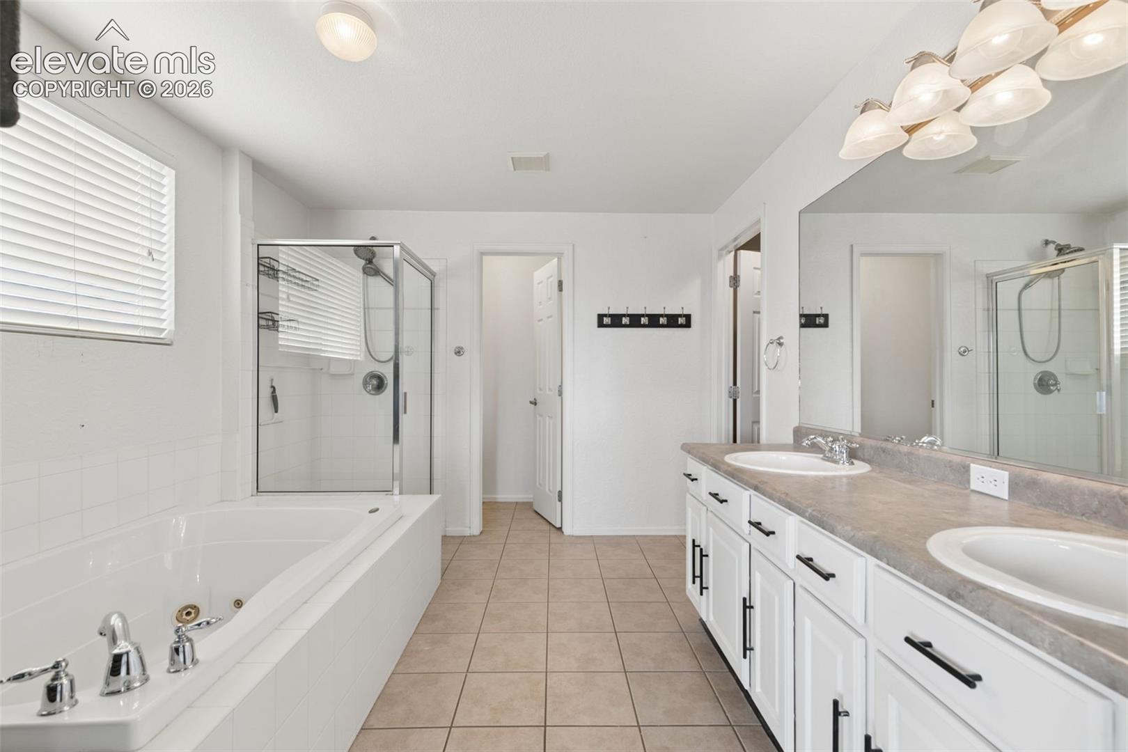 Spacious 5-Piece Bath with Dual Vanities, Jetted Tub & Separate Shower