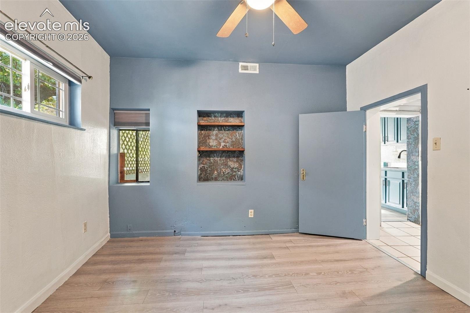 Recessed wall shelving, and a ceiling fan with integrated lighting