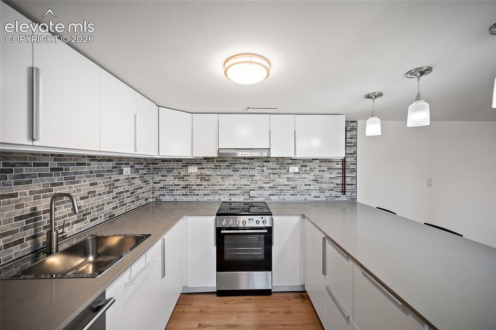 Modern Kitchenette with all appliances, soft close cabinets & Lazy Susan.
