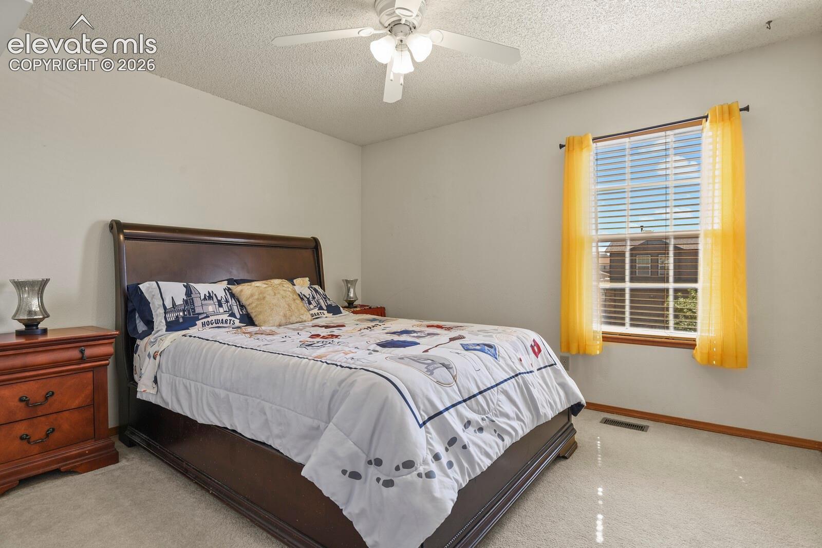 Secondary upstairs bedroom.
