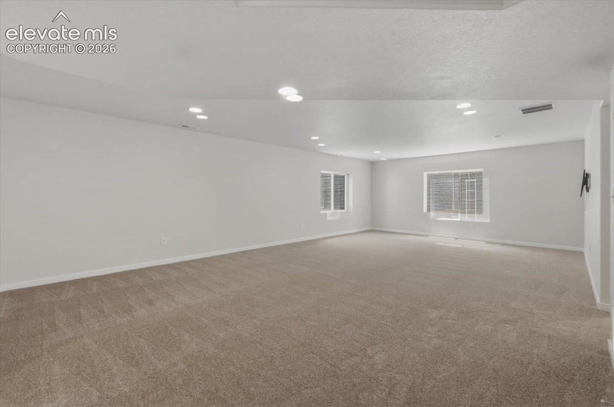 Spacious basement recreation room. 