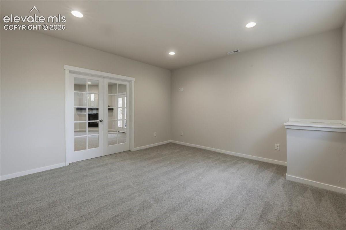 6th bedroom/flex space in basement off family room