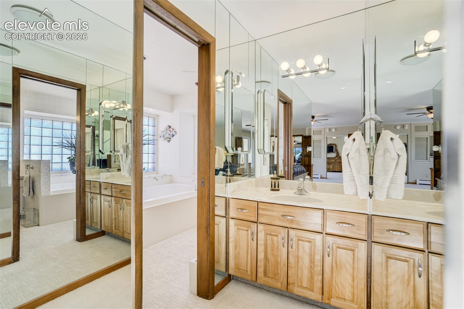 One vanity outside the full bath--no sharing counter space!