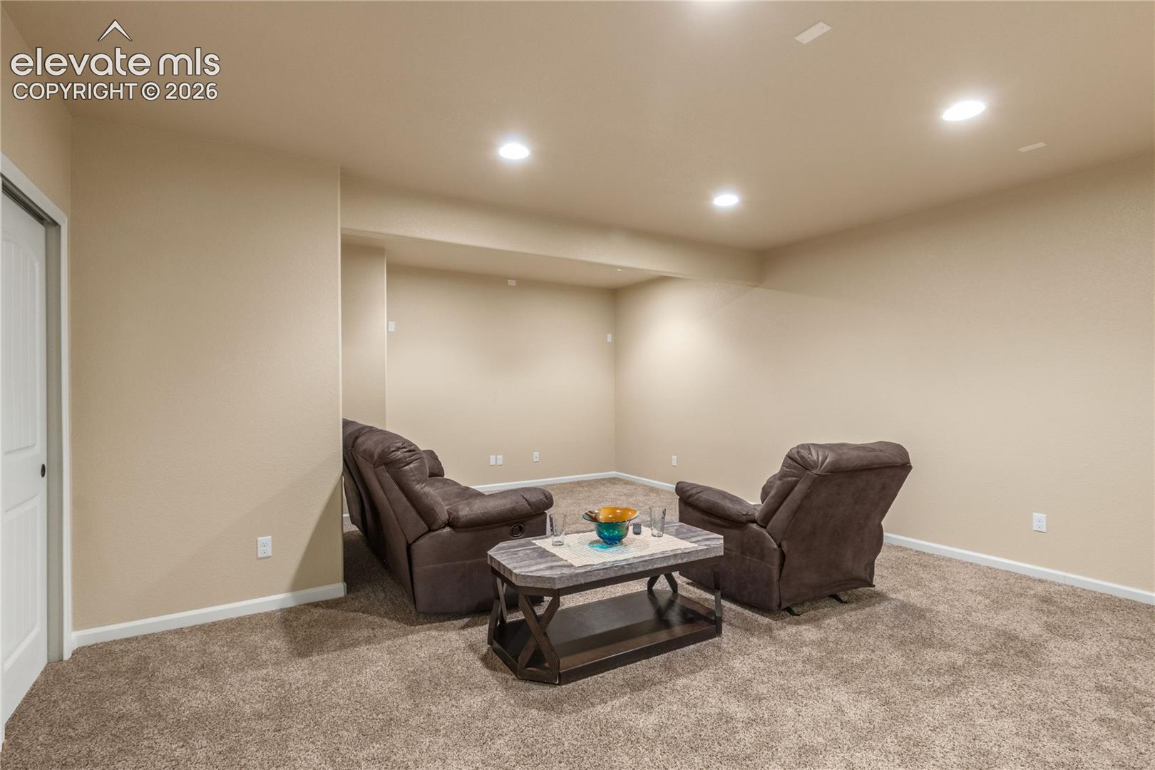 Lower level with wiring for theatre surround sound,