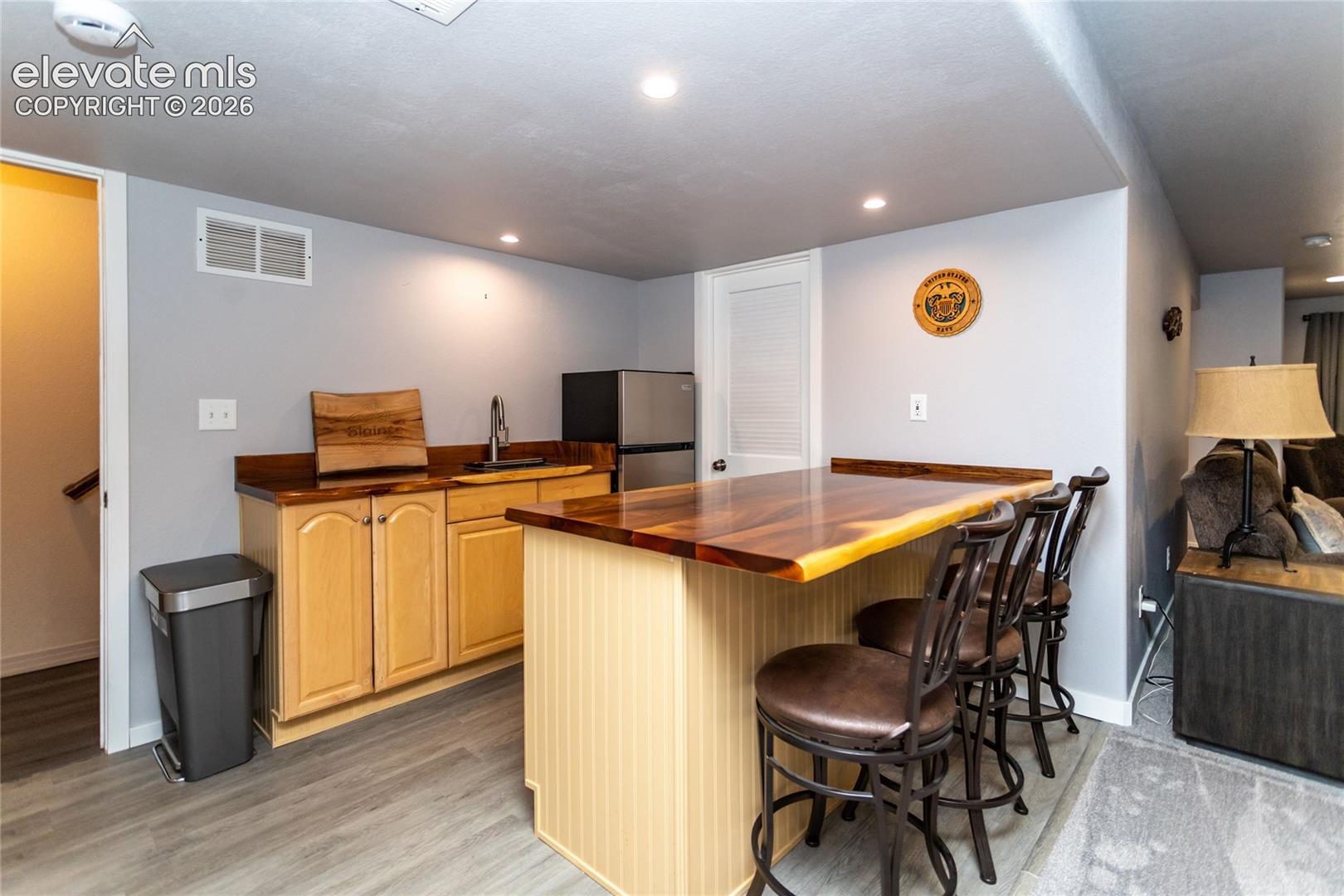 Custom live-edge acacia wood bar top