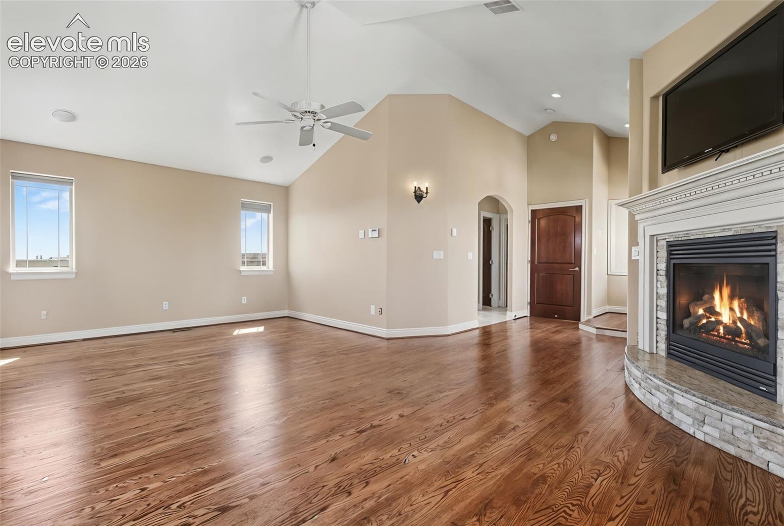Primary Bedroom w/Fireplace, Balcony and 5-Piece Walk-in Bath