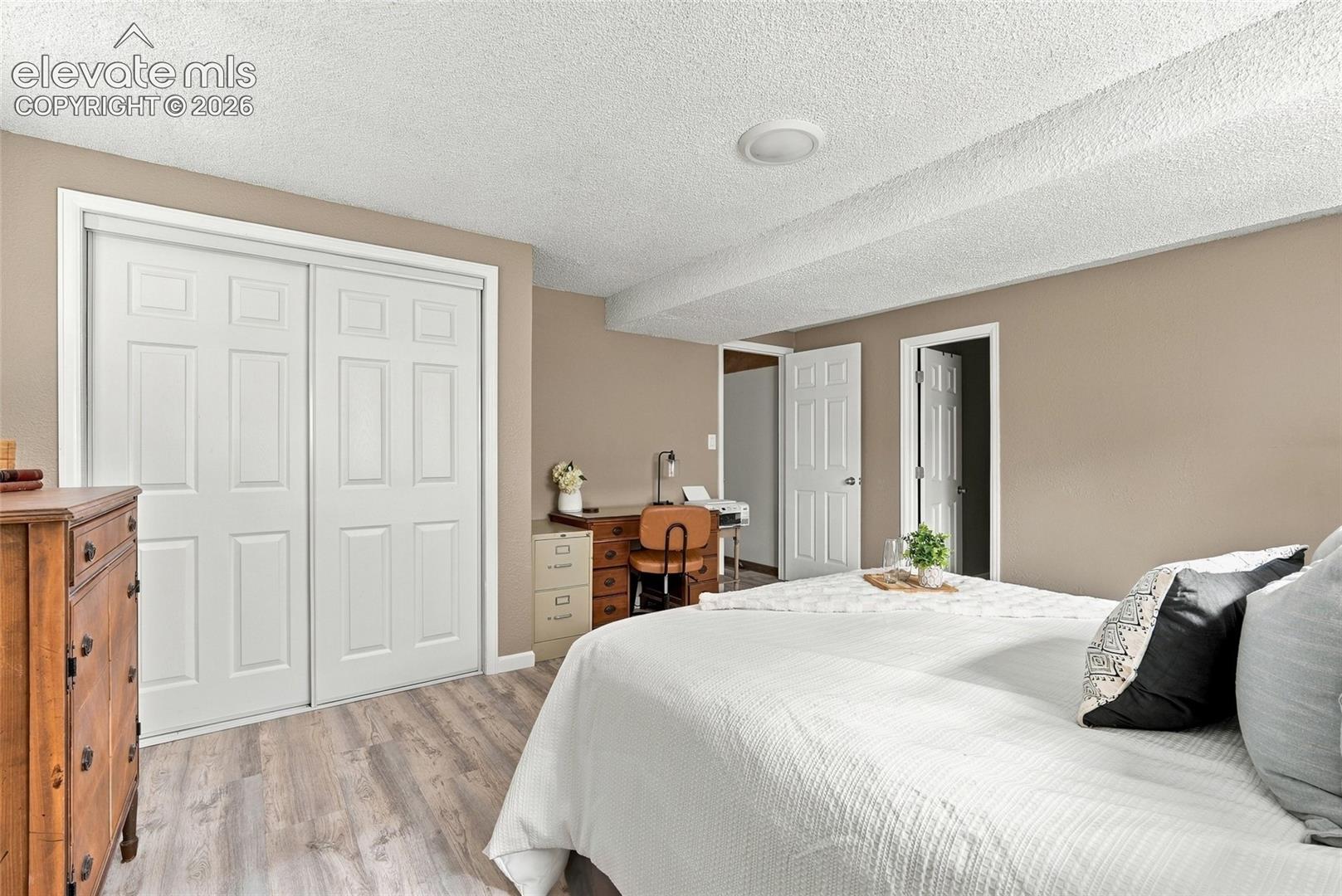 Wood-finish flooring with neutral wall tones