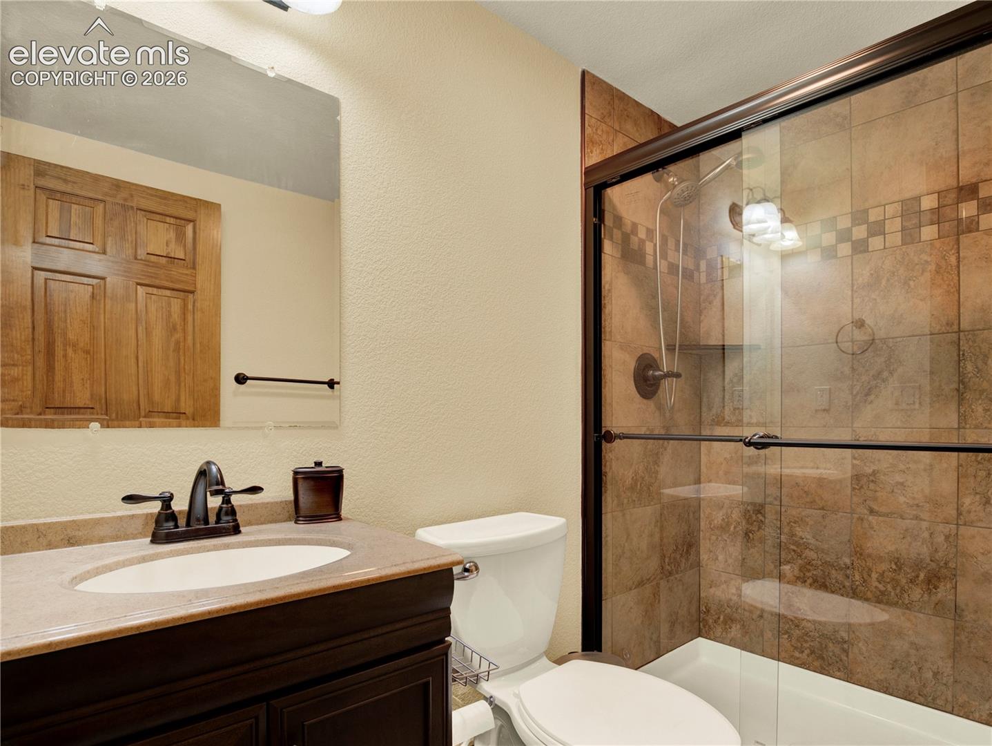 Basement bathroom located off of bar area 