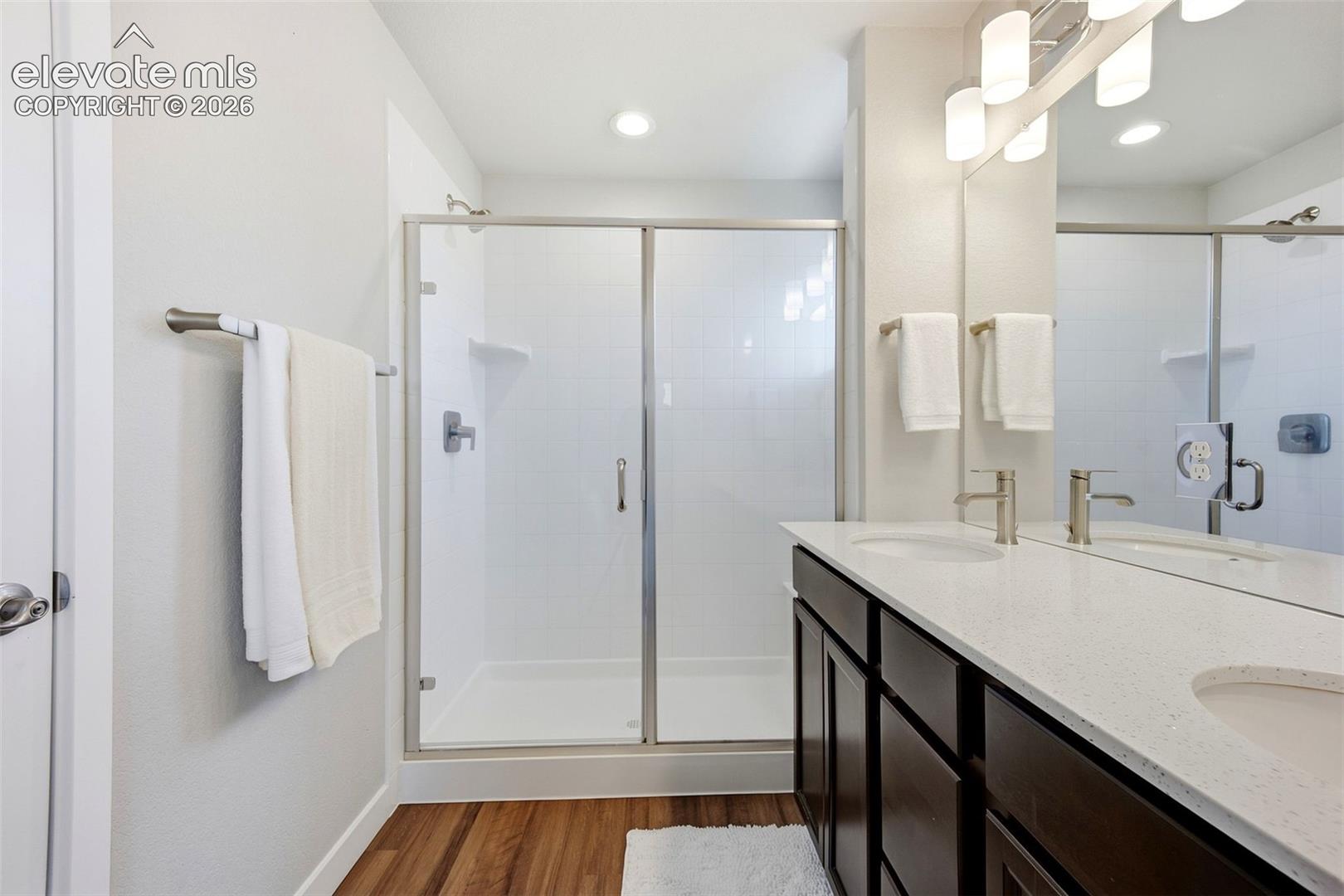 Primary bath with walk in spa shower 