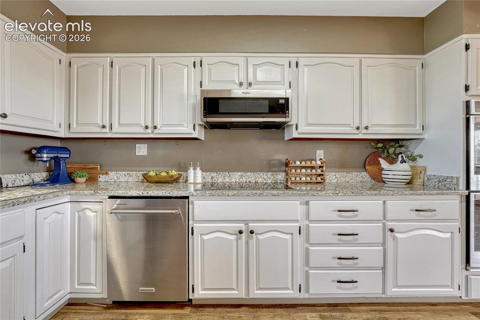 Induction cooktop and double wall ovens