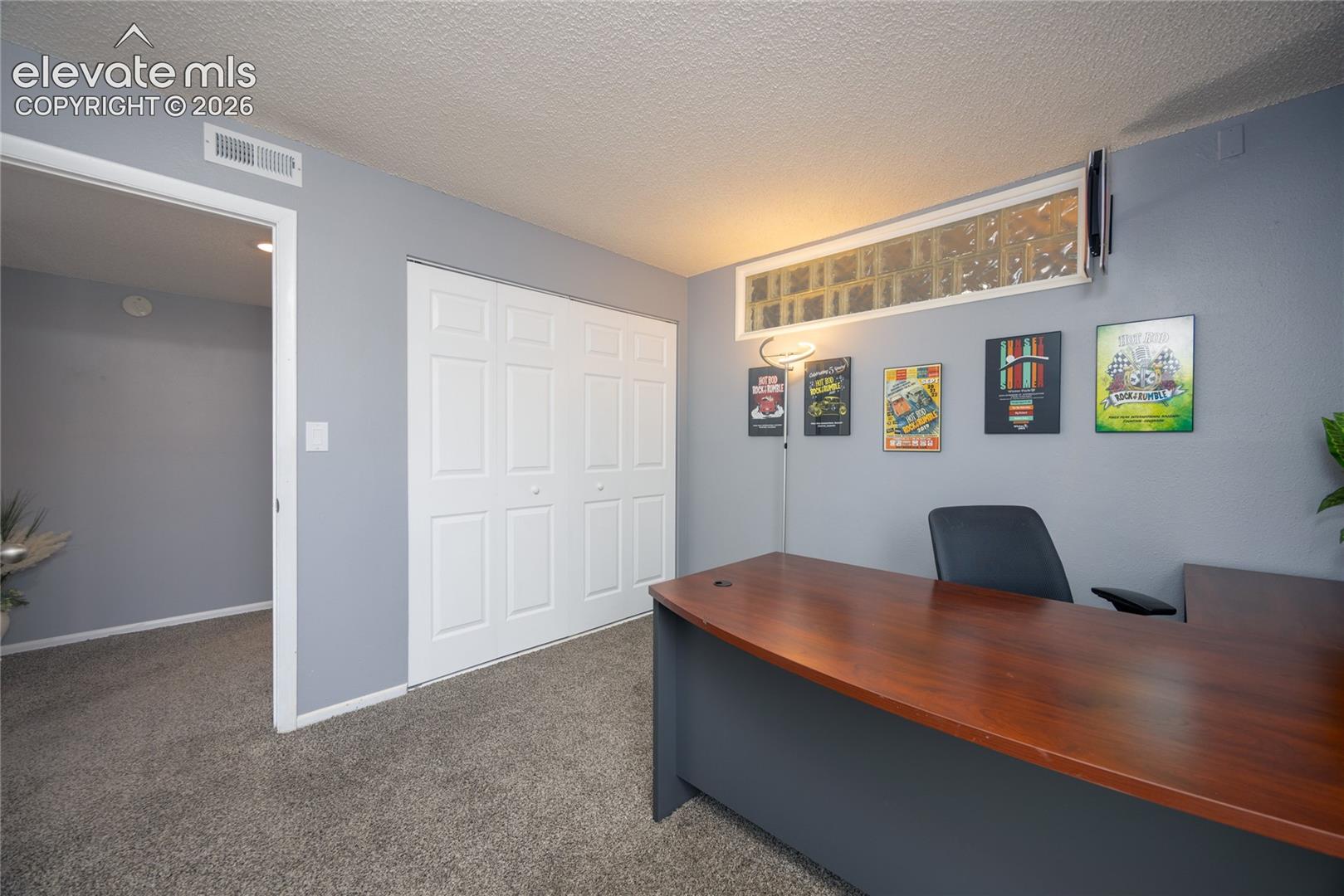 2nd Bedroom is being used as an office.