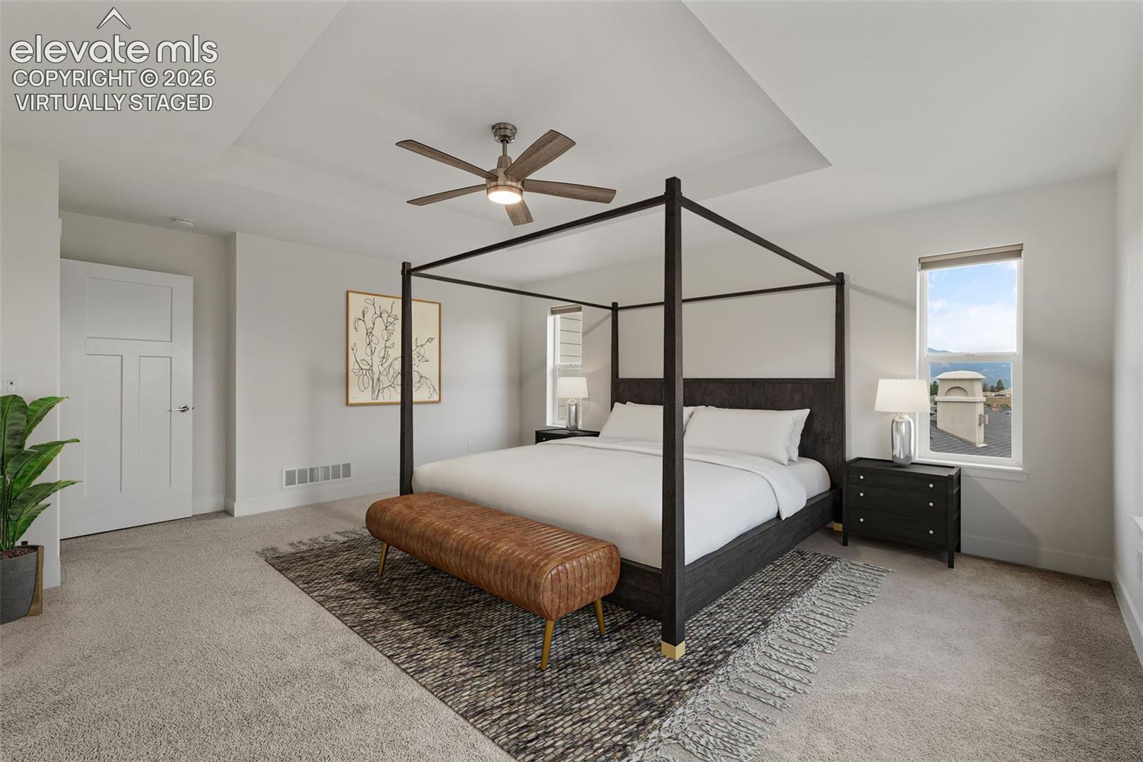 Virtually staged: Recessed ceiling with a central fan, light gray carpeting, and mountain views