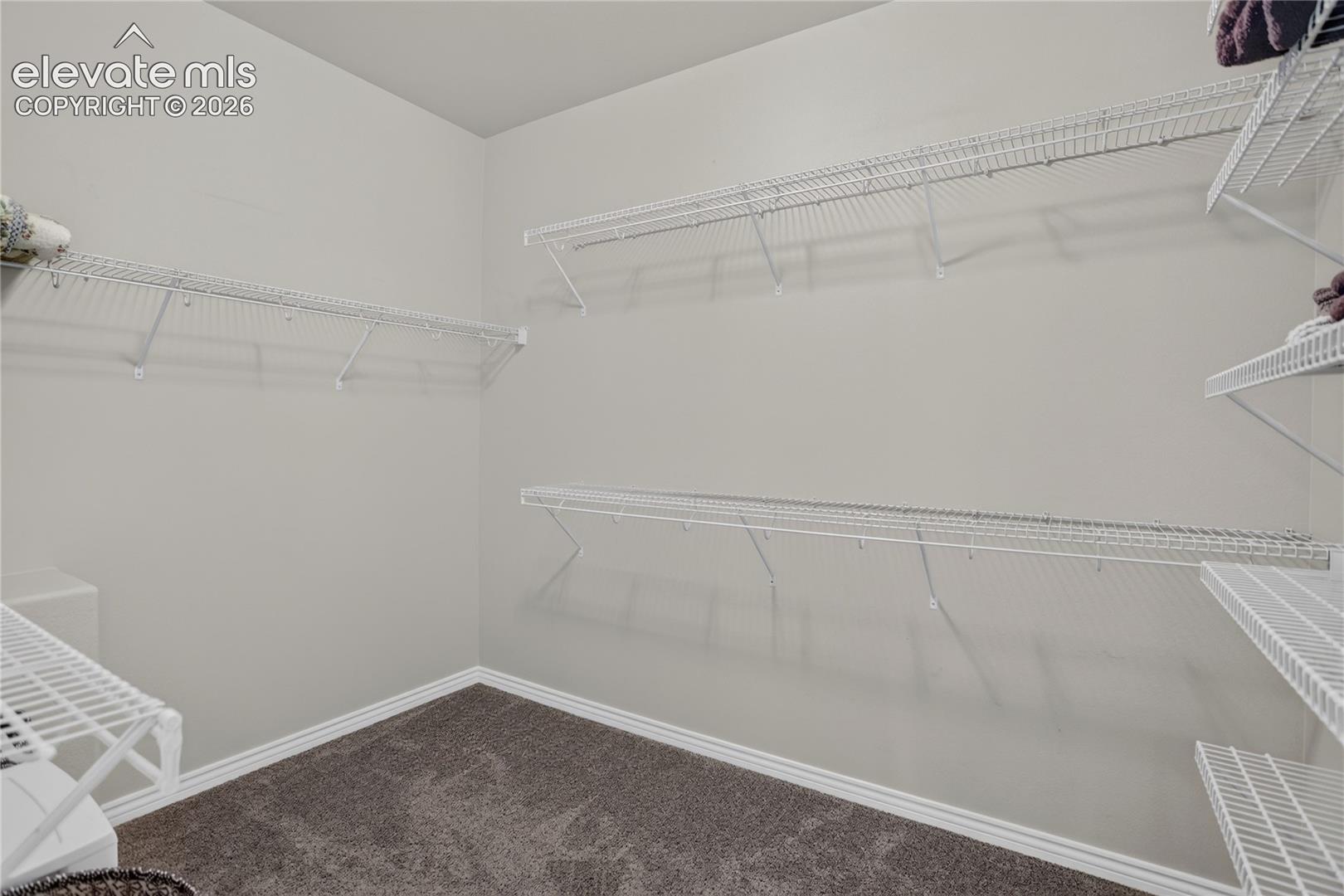 Walk-in closet for primary bedroom