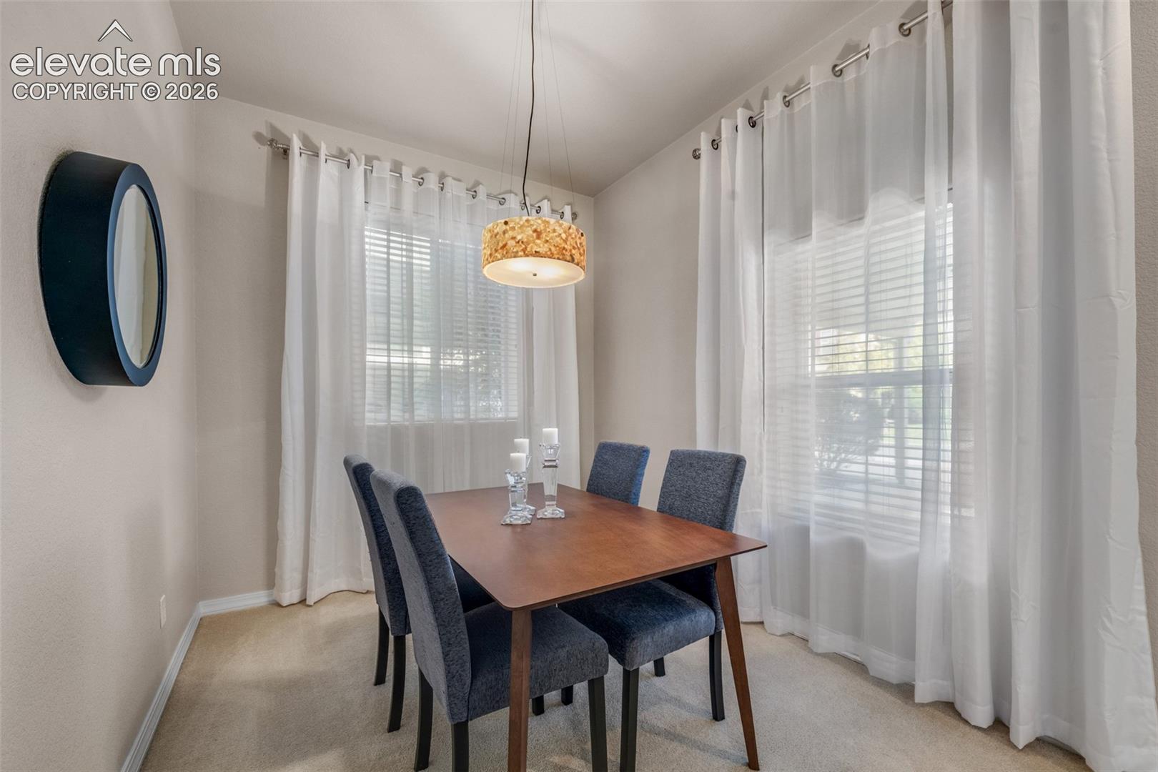 Integrated lighting fixture with a decorative shade