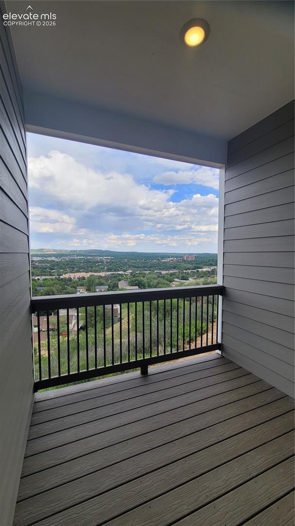 Covered composite deck off the kitchen, yielding spectacular views! 
