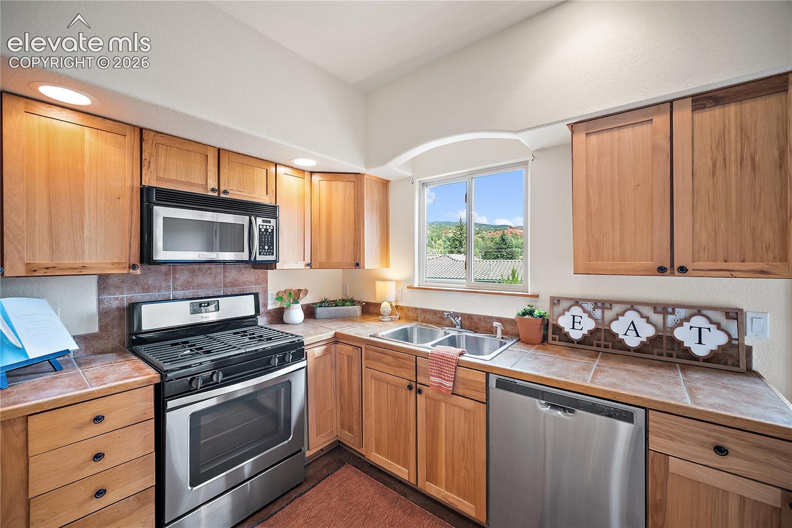 Gas range, plenty of cabinet and counter space. 