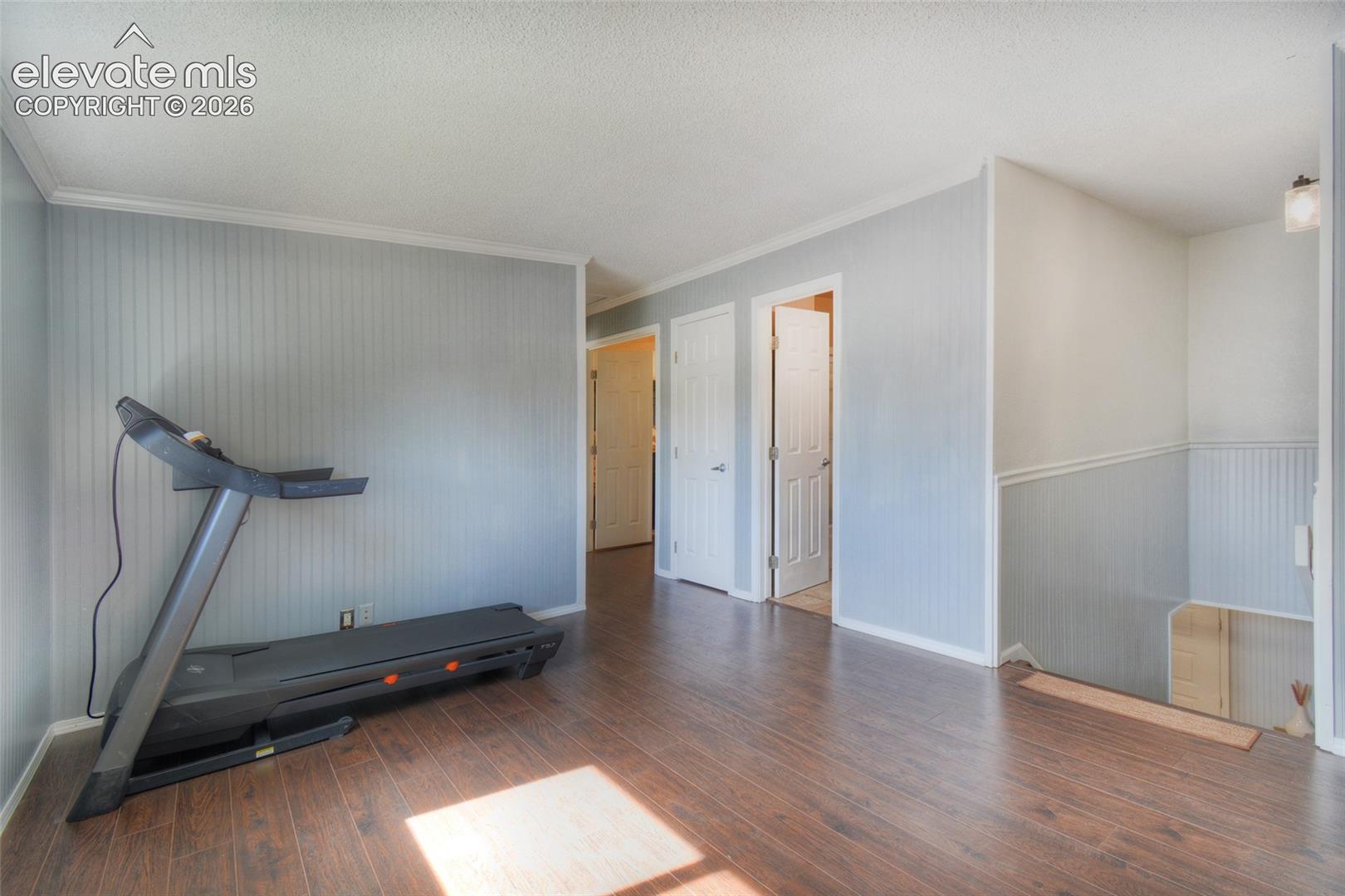 Choose how to furnish the open upper level space as a office, playroom area, workout or hobby room?