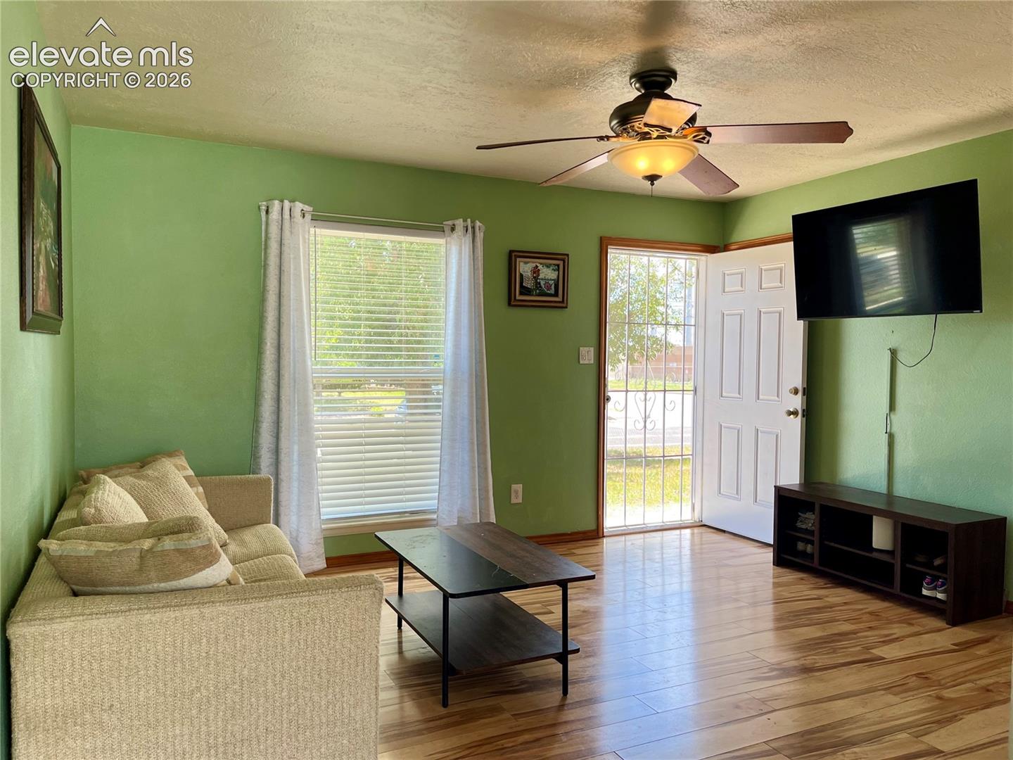 Spacious living area filled with natural light