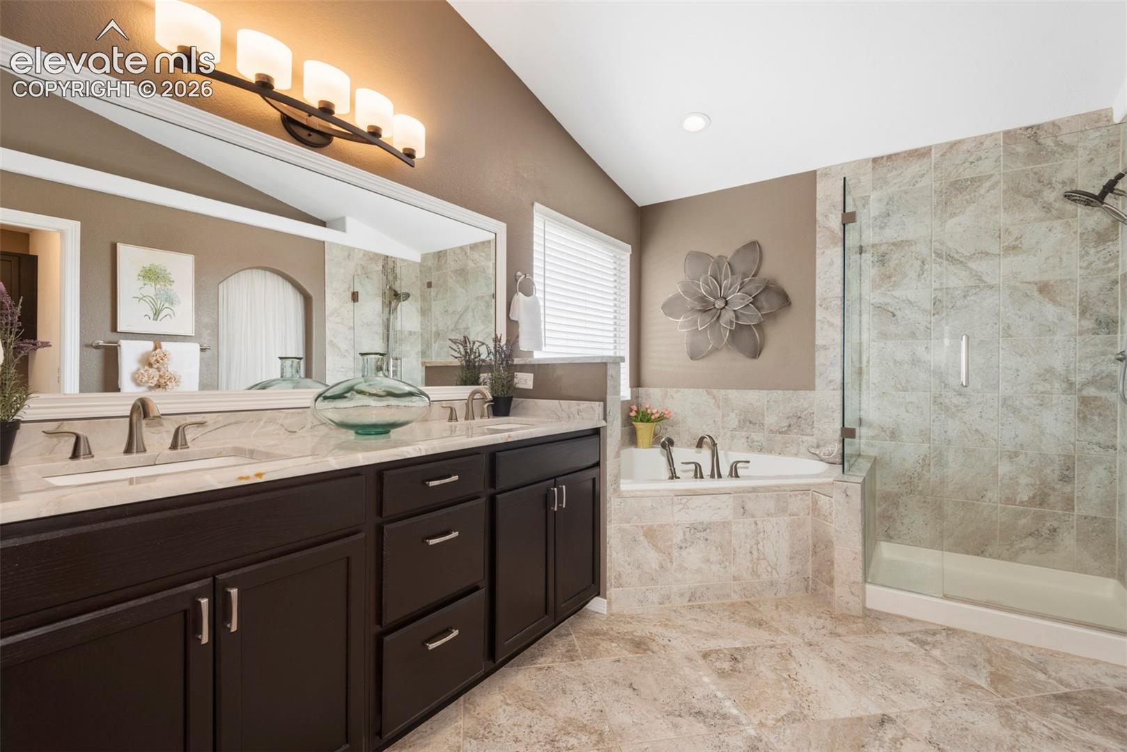 What a Beautiful 5 Piece Bath, Plenty of Room, Vaulted Ceilings, and a Large Jetted Tub. Perfect Place to come and Relax