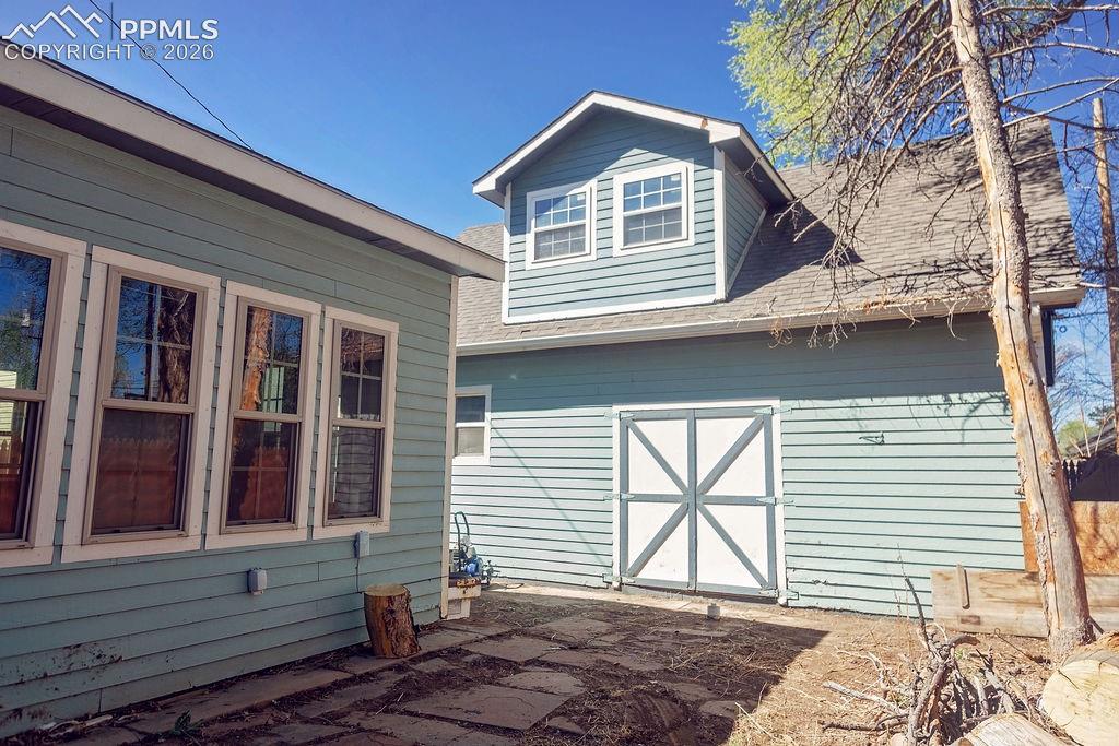 North Side of Backyard (Looking Towards 2-Car Detached Garage & Additional Partially Finished Upper Level Living Space)