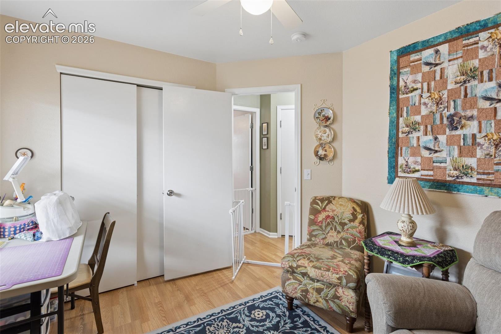 Neutral walls with wood-finish flooring
