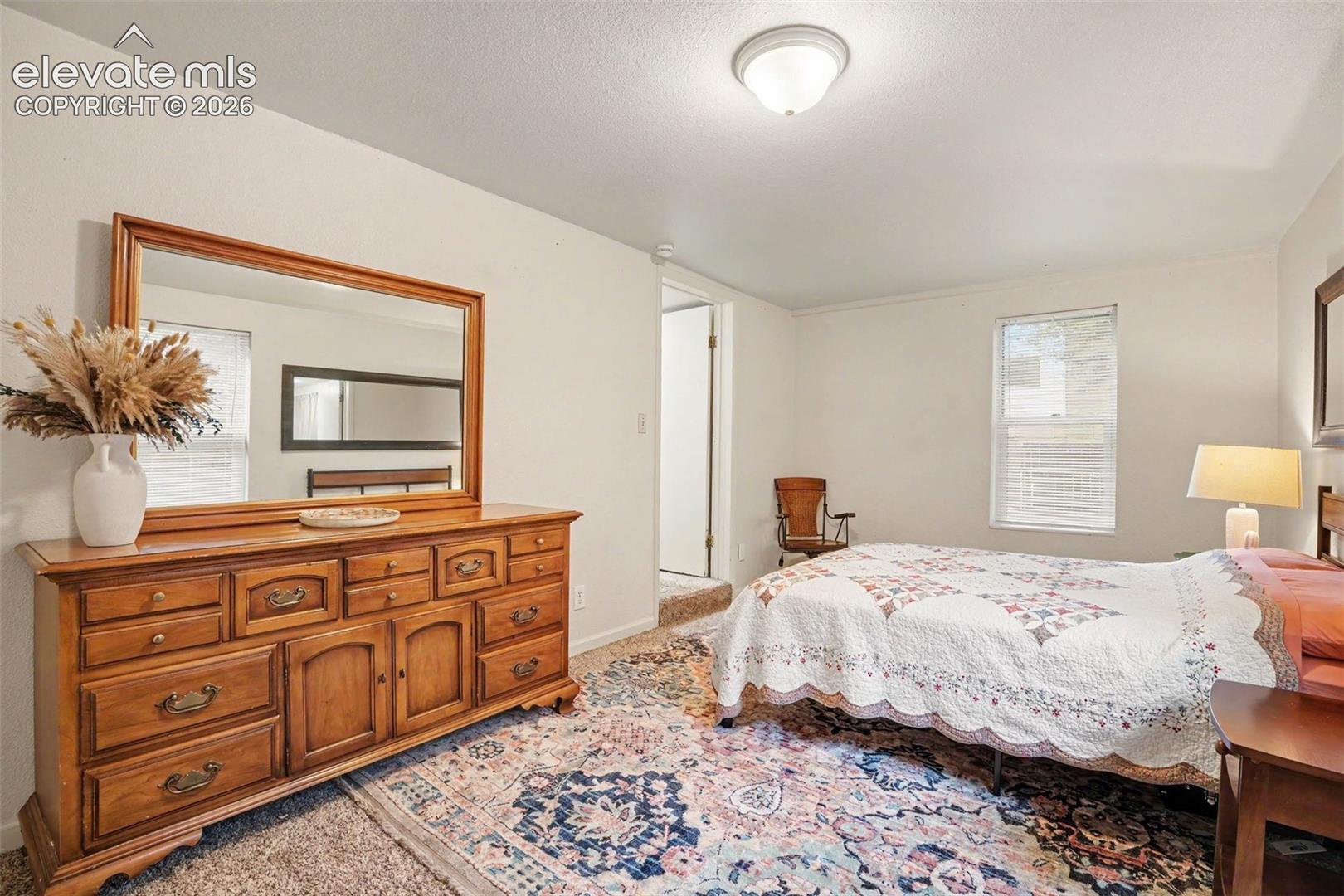 Plenty of room for additional furniture and has a window that looks out to the fenced front yard.