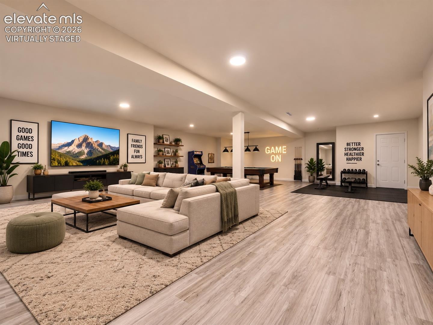 Virtually Staged Basement – Virtually staged to illustrate the basement’s potential for multiple activity zones, including a comfortable media area, game space, and additional seating. Virtually staged.
