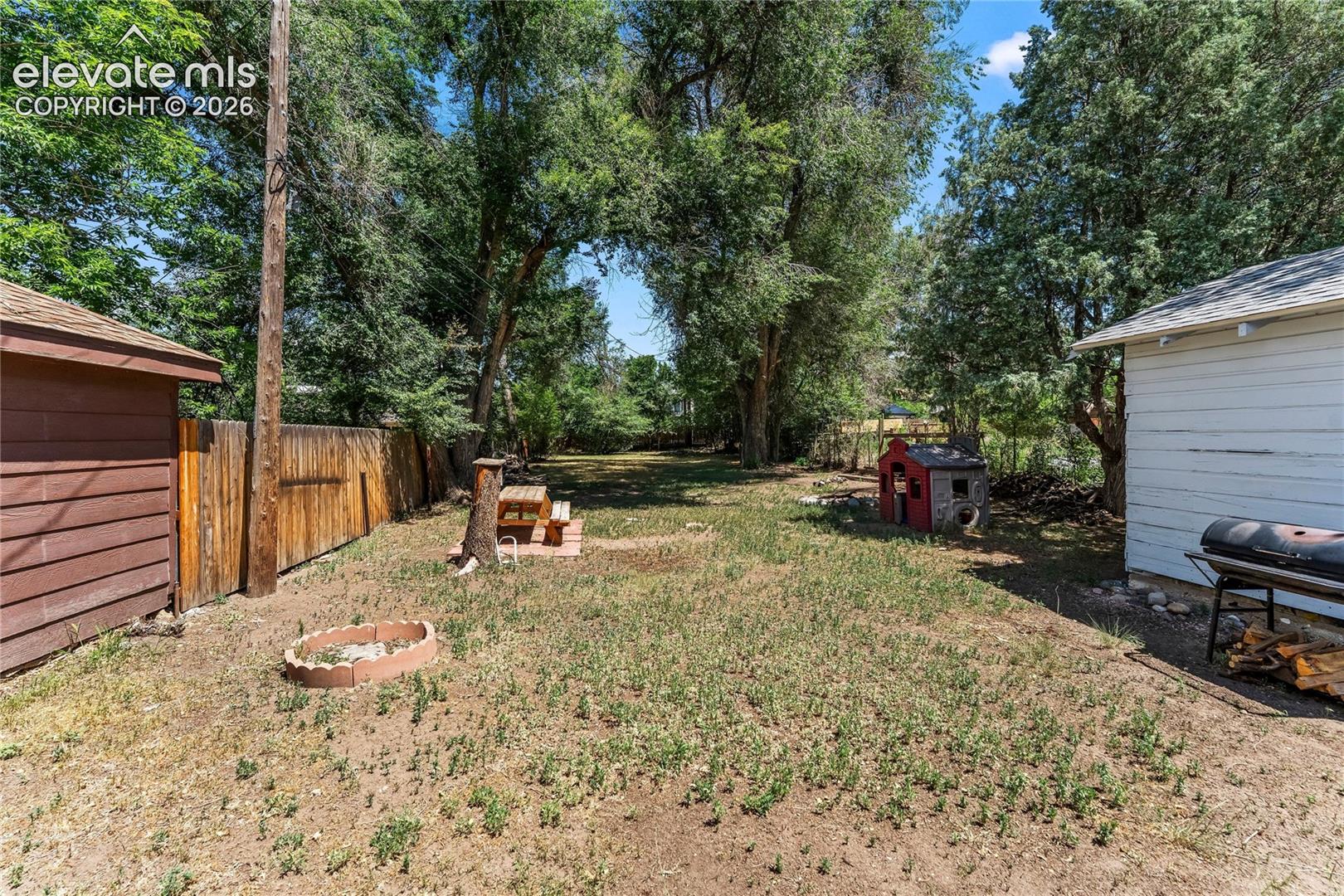 Backyard with mature trees