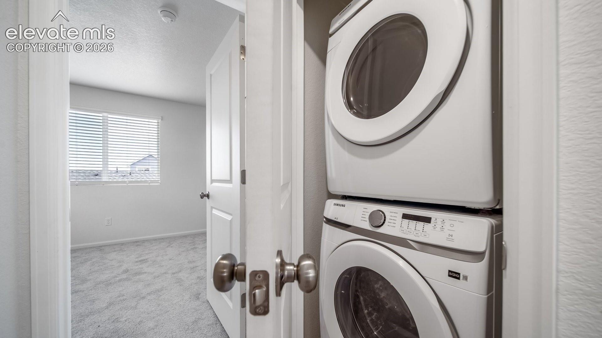 Stackable washer and dryer within a dedicated closet
*photos of a model home*