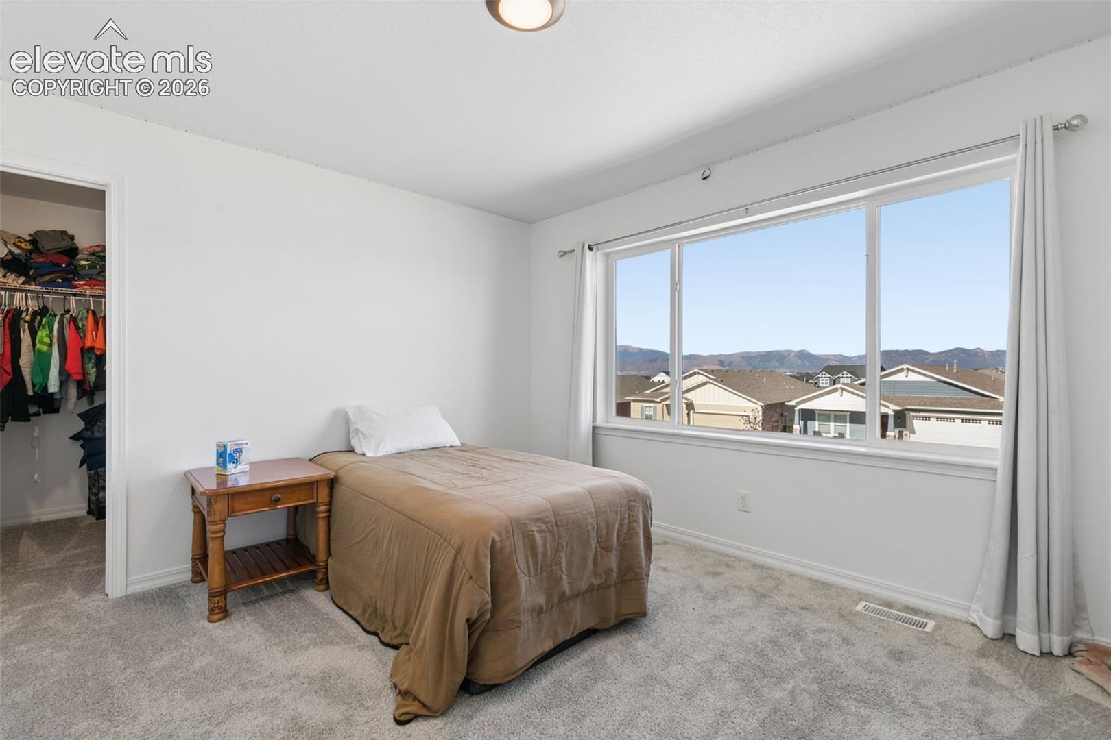 Expansive window with mountain view backdrop