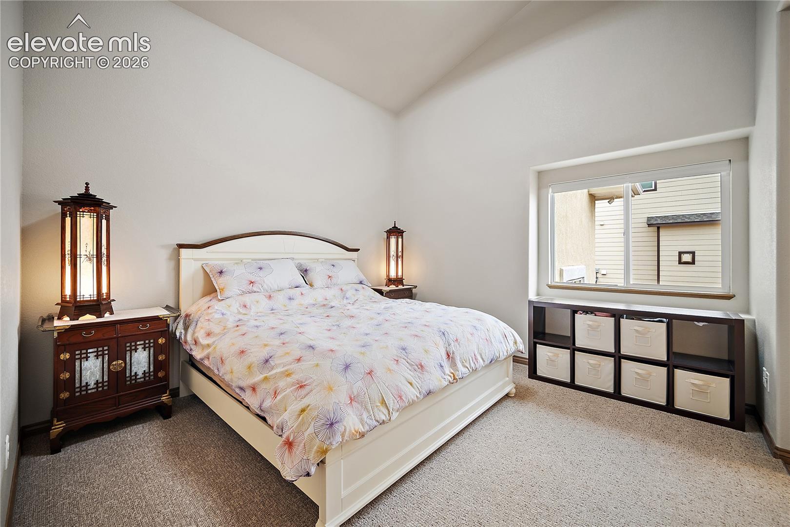 Main level bedroom, vaulted ceilings