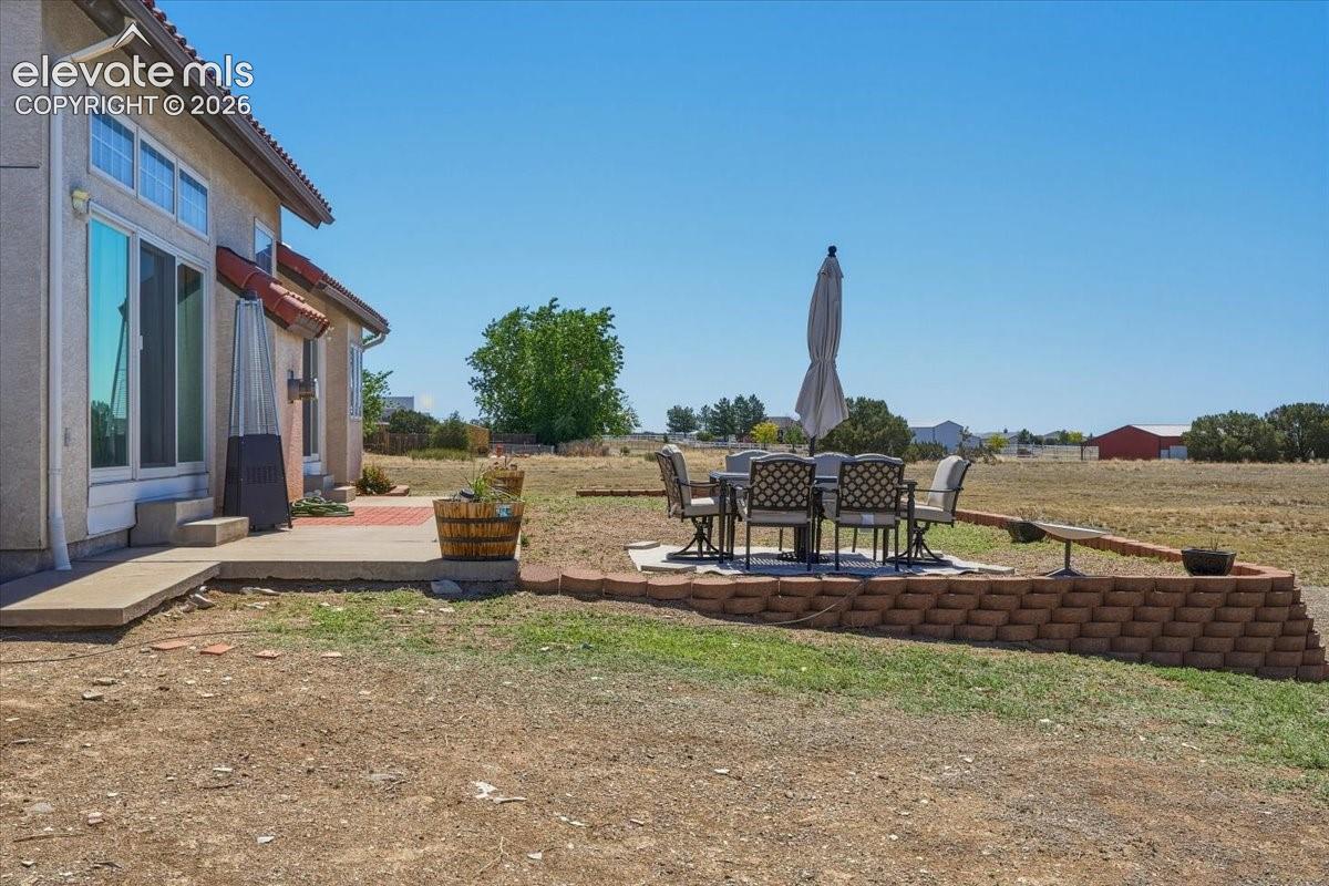 Dedicated outdoor seating area positioned to capture beautiful mountain views and Colorado sunsets.