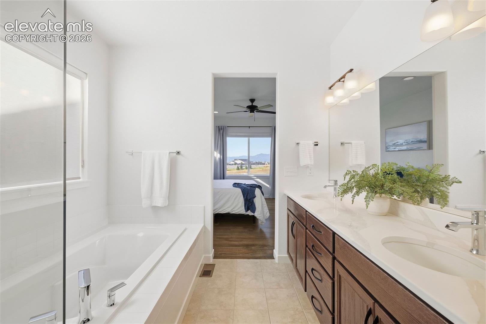 The secret to happy relationships: double vanities. Not sharing? Even better. There's plenty of room for storage in this bathroom.