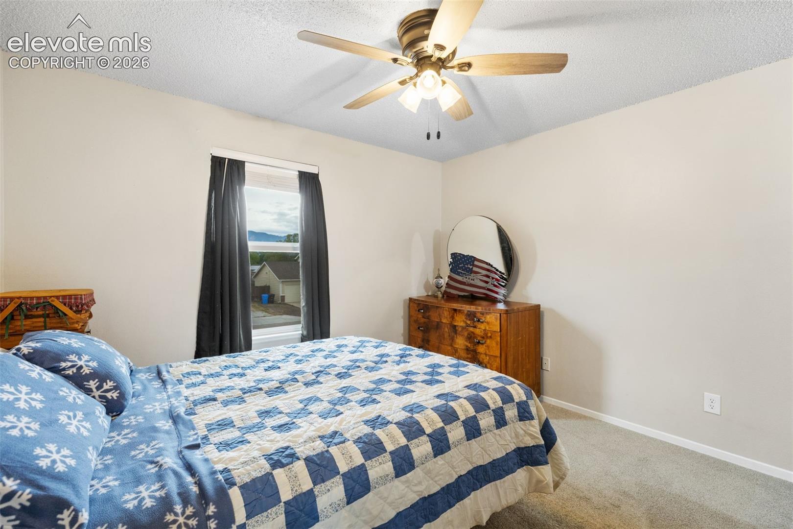 Retreat upstairs to the primary suite, featuring mountain views, a walk-in closet, and ensuite bathroom