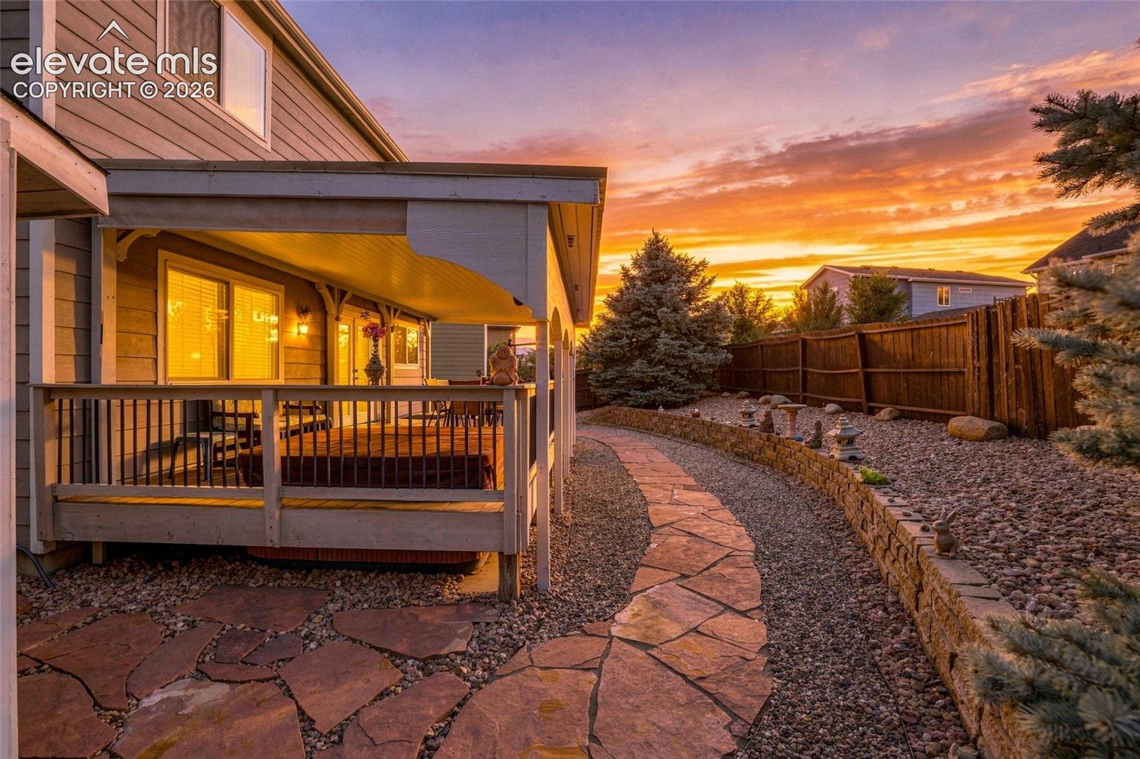 Covered wood deck with railing